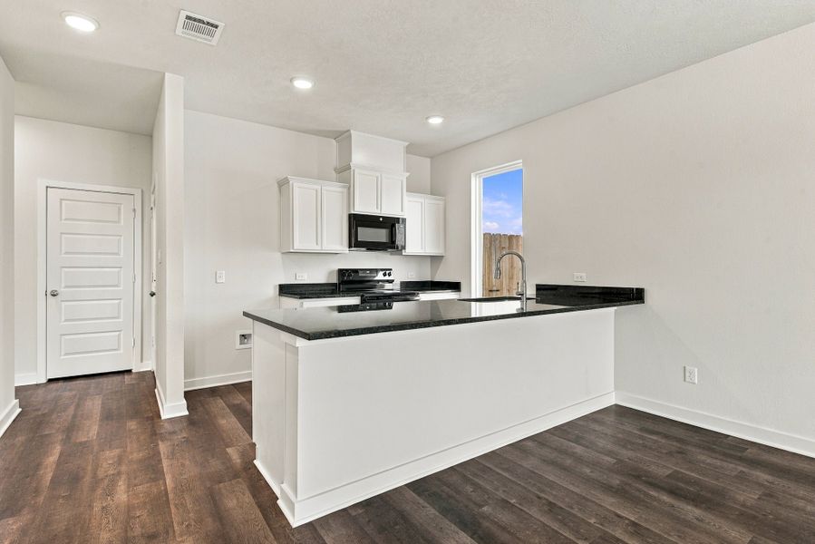 Furnished interior view inside a new home in The Cottages at Pagosa Springs, Bryan (Image 5).
