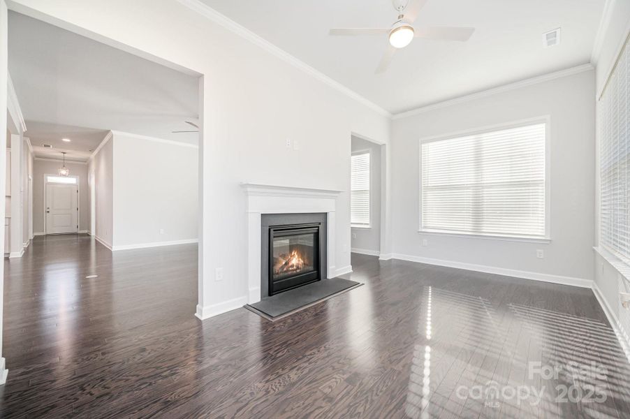 Amazing sunroom featuring a see-through, two-sided gas fireplace.
