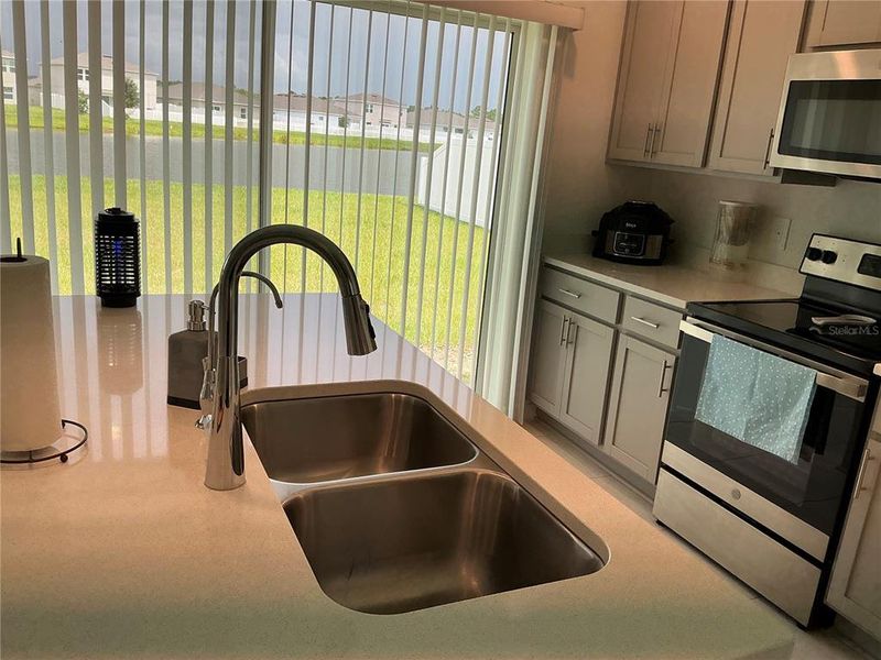 Furnished interior view inside a new home in , Kissimmee (Image 8).