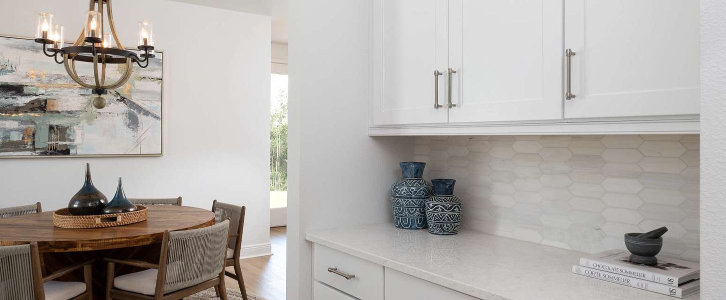 Representative furnished interior of a home built from the Duval II by Ashton Woods in Northlake at Ovation, Winter Garden (Image 32).