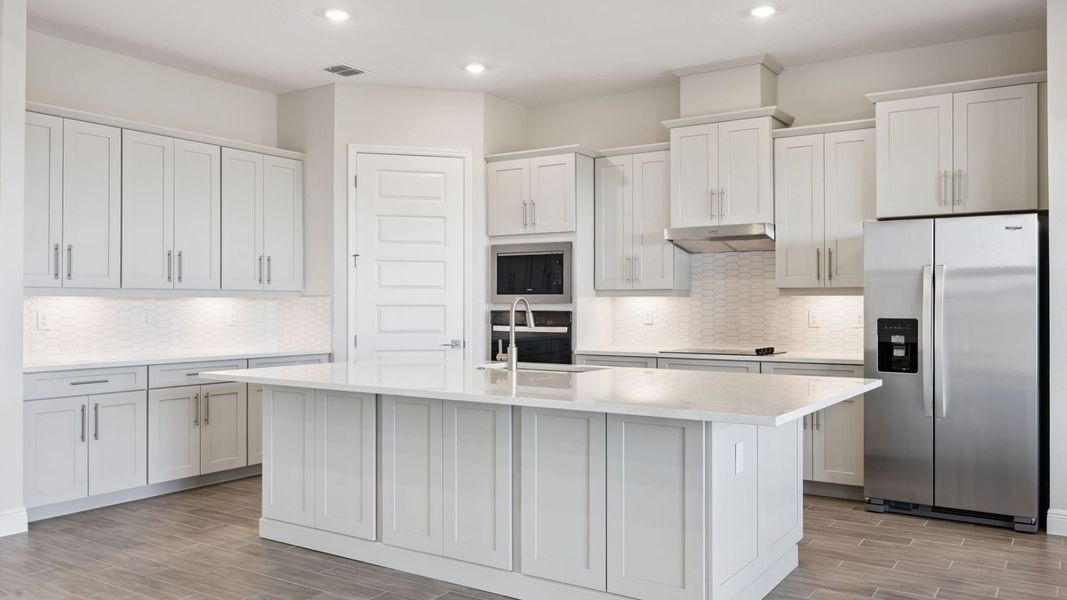 Representative furnished interior of a home built from the Everett by D.R. Horton in Buena Lago, St. Cloud (Image 5).