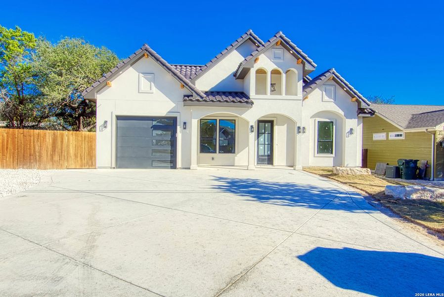 Front exterior of a new home in , Spring Branch, TX, highlighting curb appeal (Image 17). Front exterior of a new home in , Spring Branch, TX, highlighting curb appeal (Image 17).