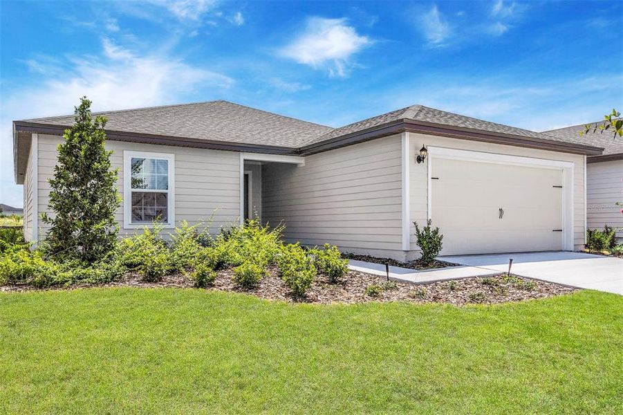 Front exterior of a new home in Marion Oaks, Ocala, FL, highlighting curb appeal (Image 2).