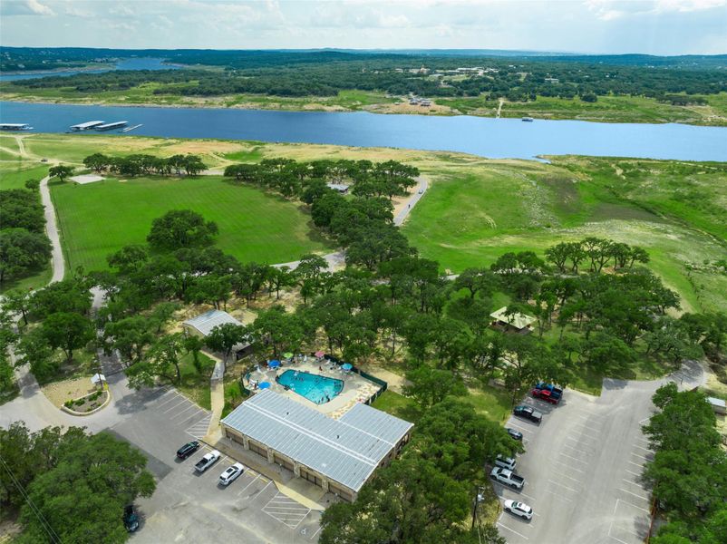 Aerial view of property's location featuring a nearby body of water