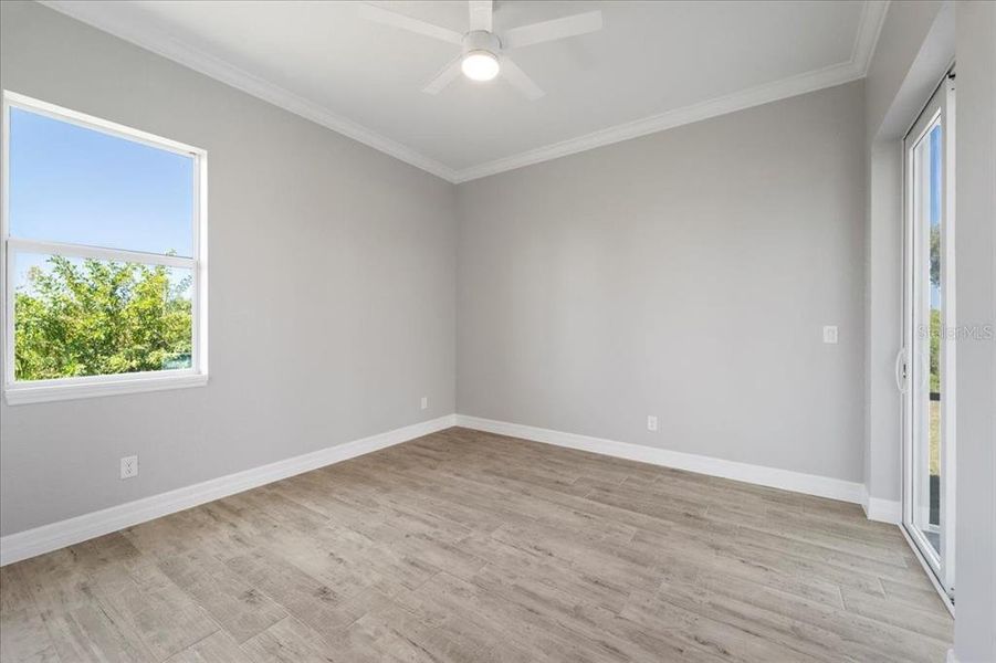 Spacious, unfurnished interior of a new home in , Port Charlotte (Image 26).