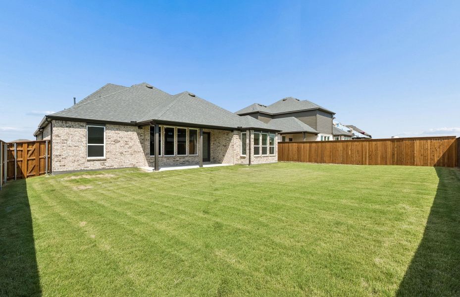 Exterior details and patio area of a home in Overland Grove, Forney (Image 3). Exterior details and patio area of a home in Overland Grove, Forney (Image 3).