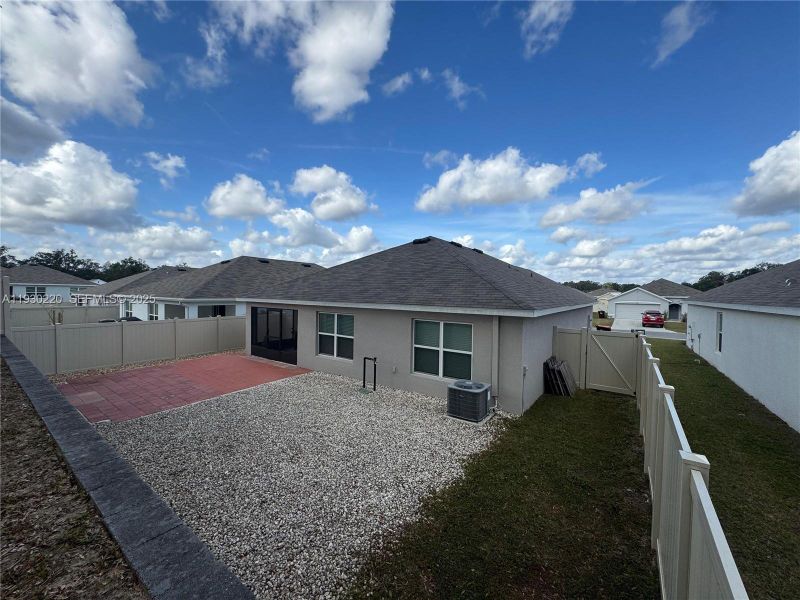 Exterior details and patio area of a home in Autumn Glen, Belleview (Image 19).