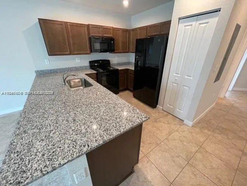Furnished interior view inside a new home in , Florida City (Image 7).