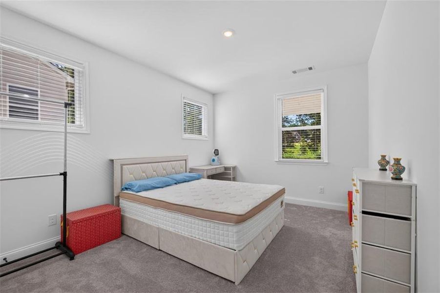 Furnished interior view inside a new home in Bailey Fence, Dacula (Image 35).