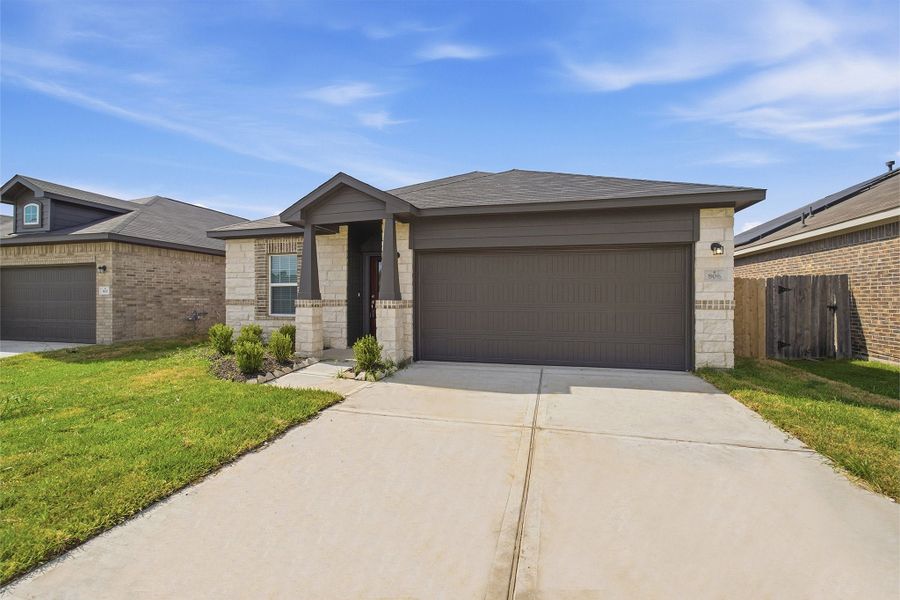 Front exterior of a new home in Pecan Estates, Crosby, TX, highlighting curb appeal (Image 26).