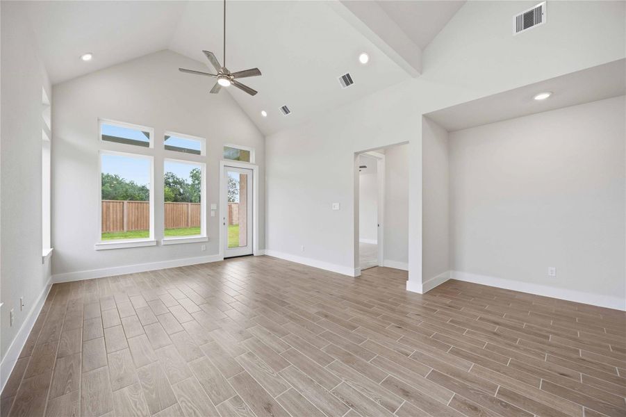 Spacious, unfurnished interior of a new home in Ellwood, Iowa Colony (Image 17).