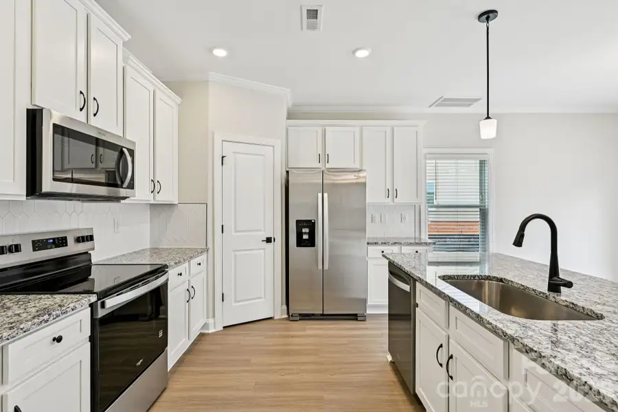 Furnished interior view inside a new home in Colonial Crossing, Troutman (Image 5).