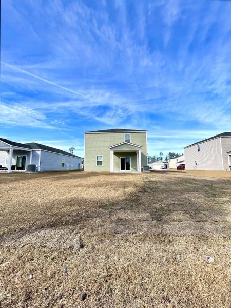 Exterior details and patio area of a home in Lindera Preserve at Cane Bay Plantation, Summerville (Image 4). Exterior details and patio area of a home in Lindera Preserve at Cane Bay Plantation, Summerville (Image 4).