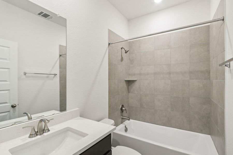 Bathroom with shower / bath combination and vanity Bathroom with shower / bath combination and vanity