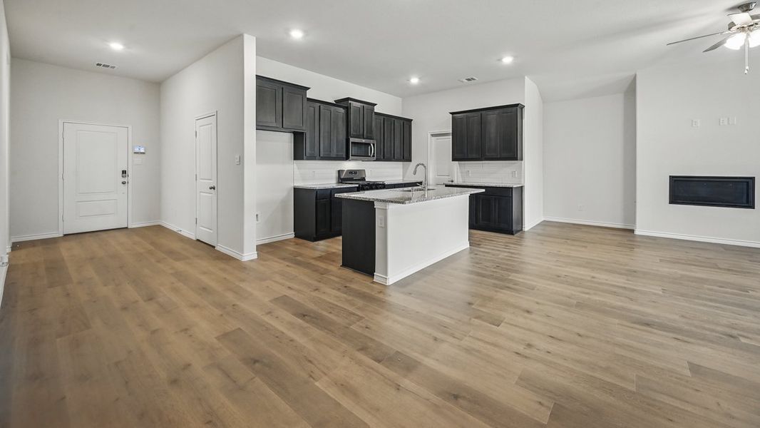 Representative unfurnished interior of a home built from the Harbour by D.R. Horton in The Woods at Lindsey Place, Anna (Image 7).