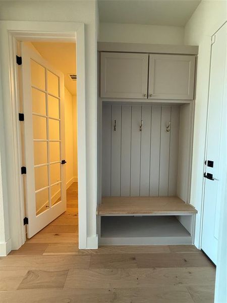 Mudroom featuring light hardwood / wood-style floors