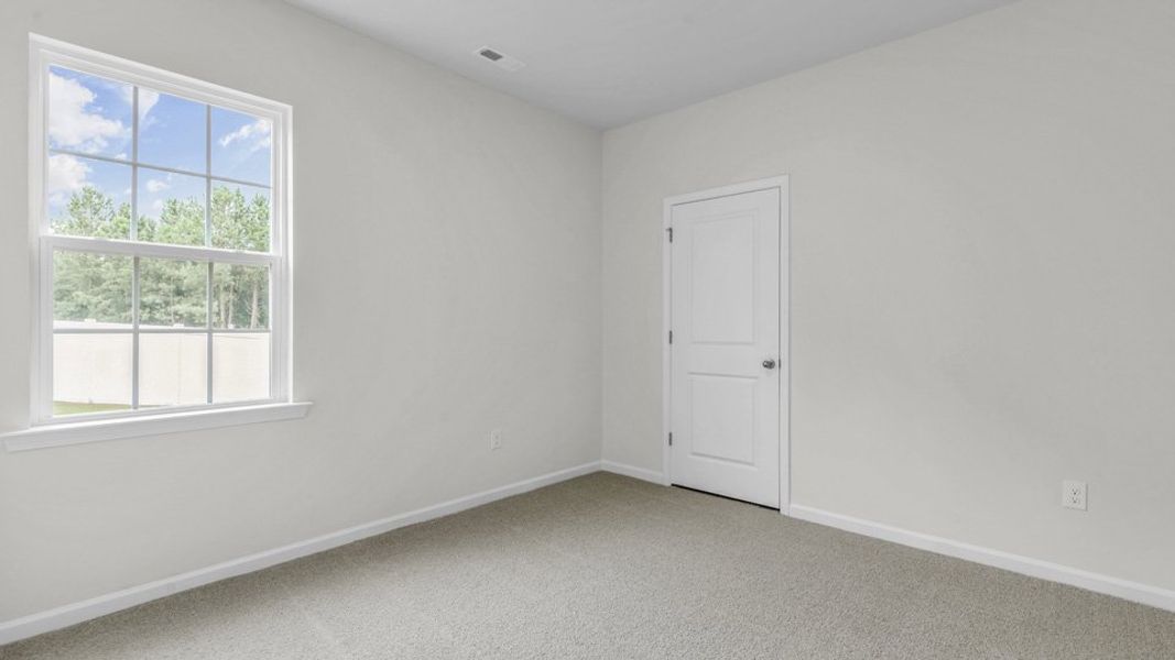 Representative unfurnished interior of a home built from the BOOTH by D.R. Horton in North Gate, Vass (Image 21).