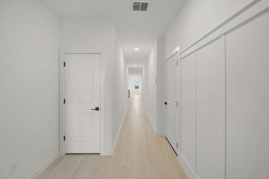 Welcoming foyer with decorative feature wall