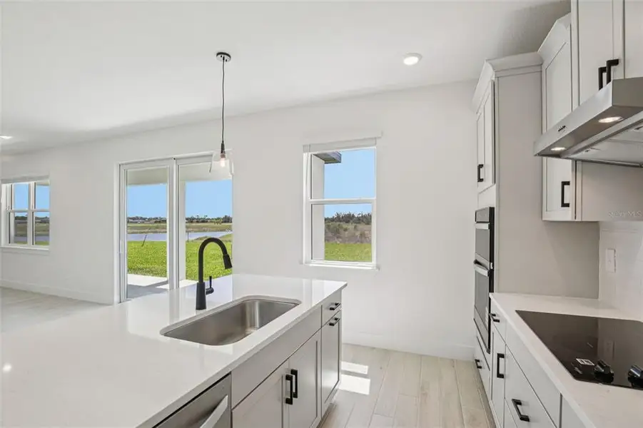 Furnished interior view inside a new home in Magnolia Bay - Reserve Series, Nokomis (Image 8).