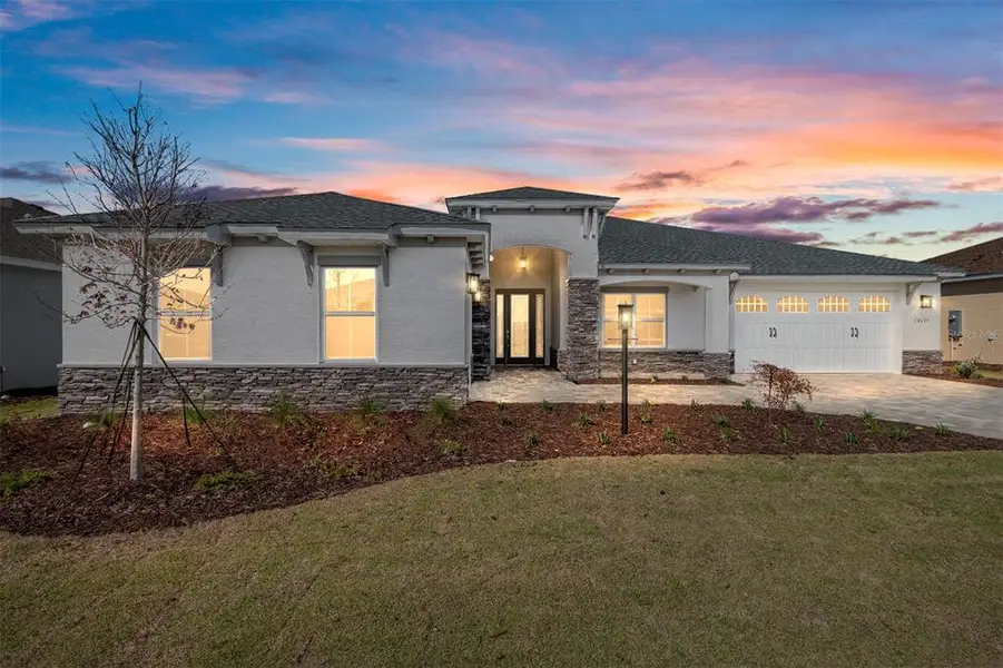 Front exterior of a new home in , Ocala, FL, highlighting curb appeal (Image 2). Front exterior of a new home in , Ocala, FL, highlighting curb appeal (Image 2).