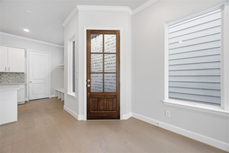 Organized Elegance: Elevate your entryway with a meticulously designed built-in bench and cubbies, blending form with function in your home’s greeting space.