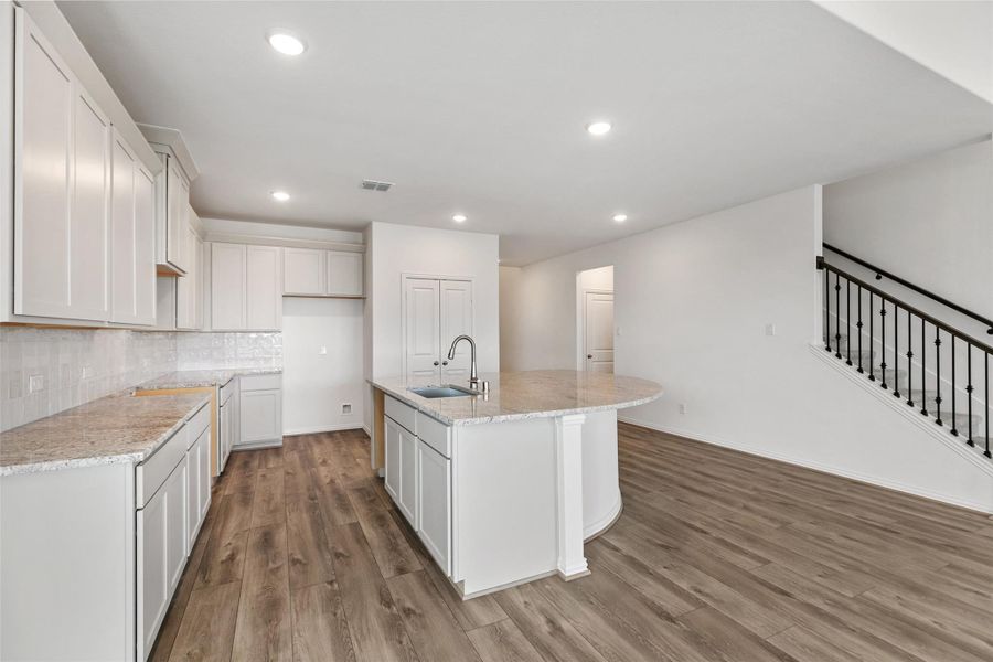 Furnished interior view inside a new home in Aldeana, Bonney (Image 11).