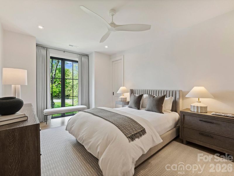 Upper level guest suite 2 with full bath