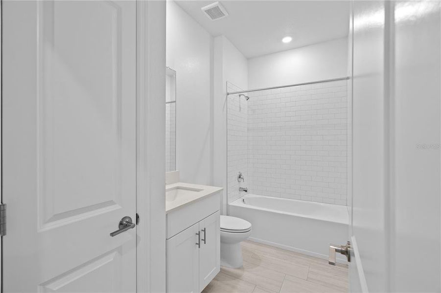 Furnished interior view inside a new home in Angeline, Land O' Lakes (Image 10).