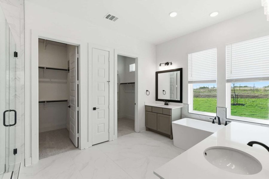 Representative furnished interior of a home built from the Malibu by Chesmar Homes in Sienna Lakes, San Antonio (Image 8).