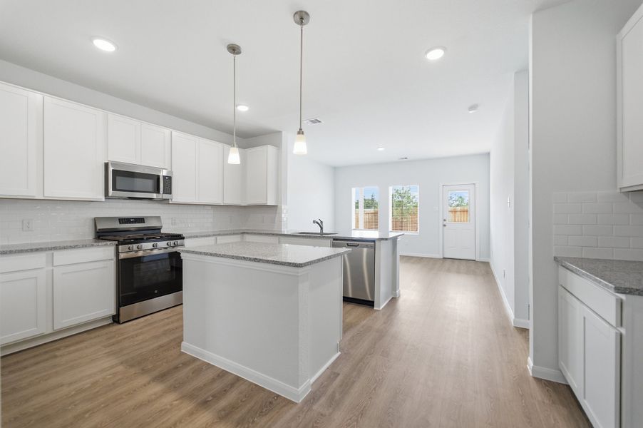 Furnished interior view inside a new home in The Pines at Seven Coves, Willis (Image 13).