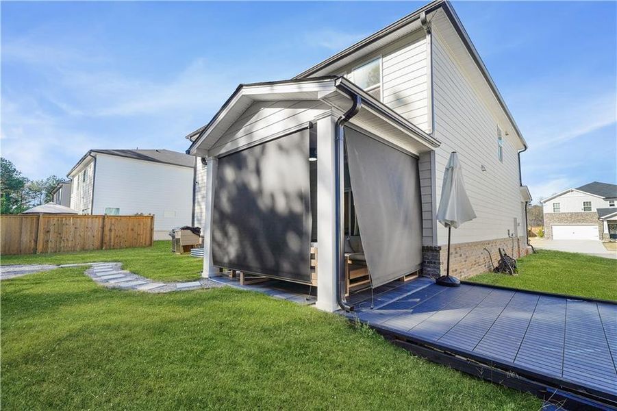 Exterior details and patio area of a home in , Loganville (Image 30).