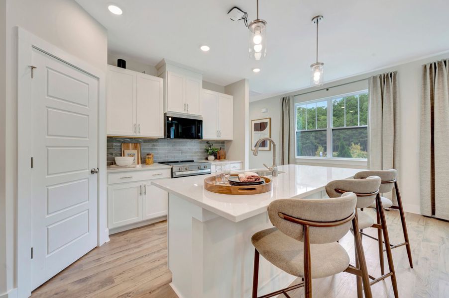 Representative furnished interior of a home built from the Valencia II by Mattamy Homes in Ashmore Townes, Garner (Image 8). Representative furnished interior of a home built from the Valencia II by Mattamy Homes in Ashmore Townes, Garner (Image 8).