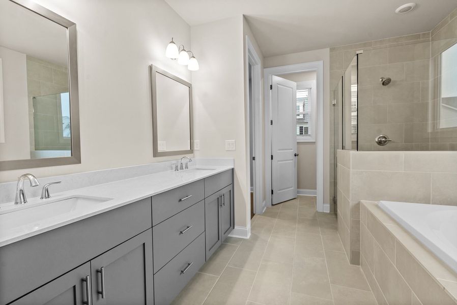 Representative furnished interior of a home built from the The McIntosh by The Providence Group in Promenade at Sawnee Village, Cumming (Image 11).