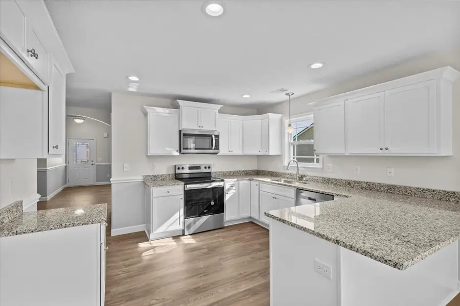 Representative furnished interior of a home built from the Morgan by Enchanted Homes in Mills Gin, Campobello (Image 5).