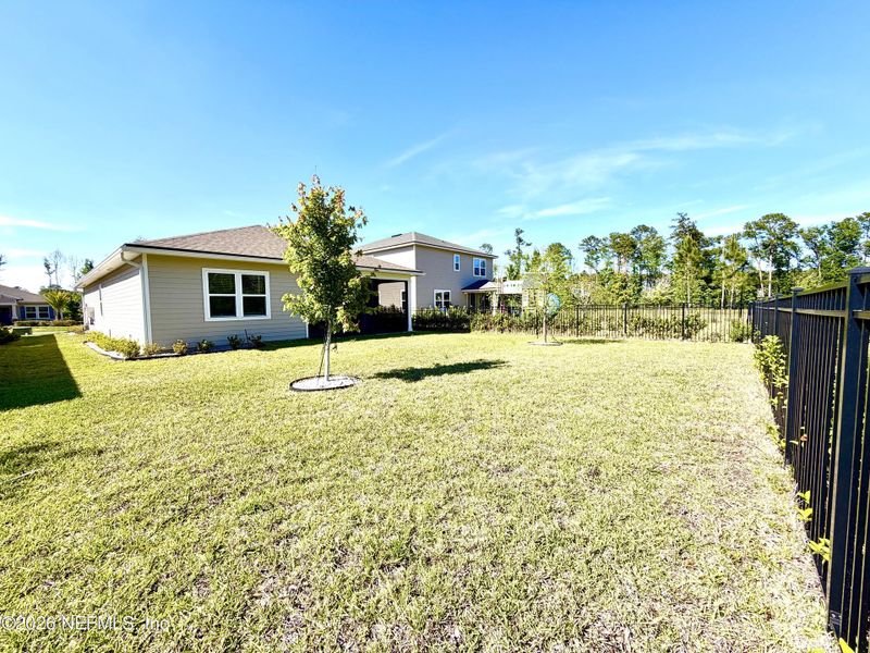 Exterior details and patio area of a home in Seasons at TrailMark, St. Augustine (Image 40).