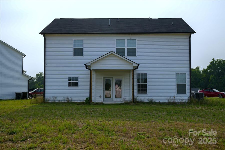 Front exterior of a new home in , Clayton, NC, highlighting curb appeal (Image 1).