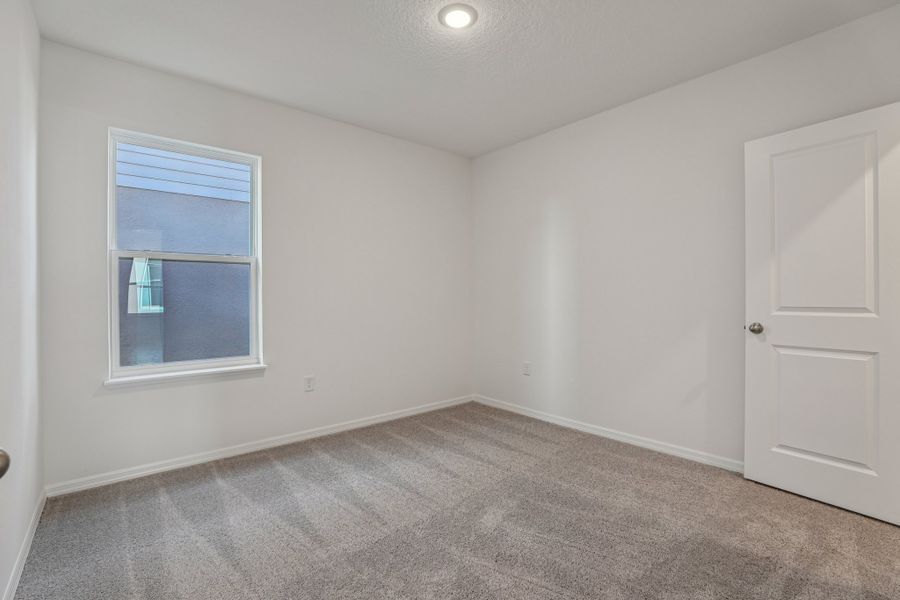 Representative unfurnished interior of a home built from the Vista by Maronda Homes in Heritage Station, Punta Gorda (Image 25).