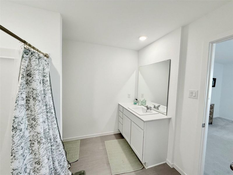Another view of the master bathroom leading to the bedroom. Another view of the master bathroom leading to the bedroom.