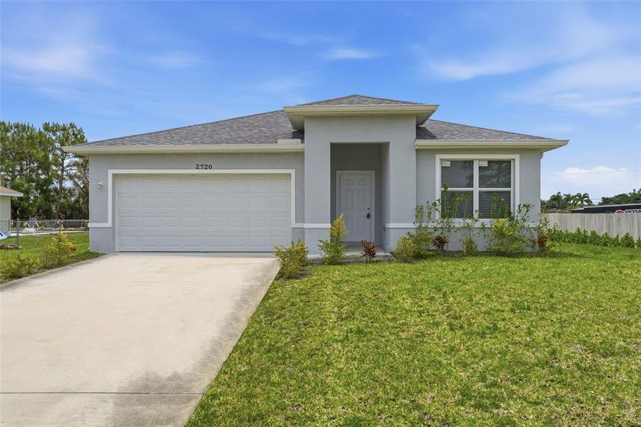 Front exterior of a new home in , Cape Coral, FL, highlighting curb appeal (Image 23).