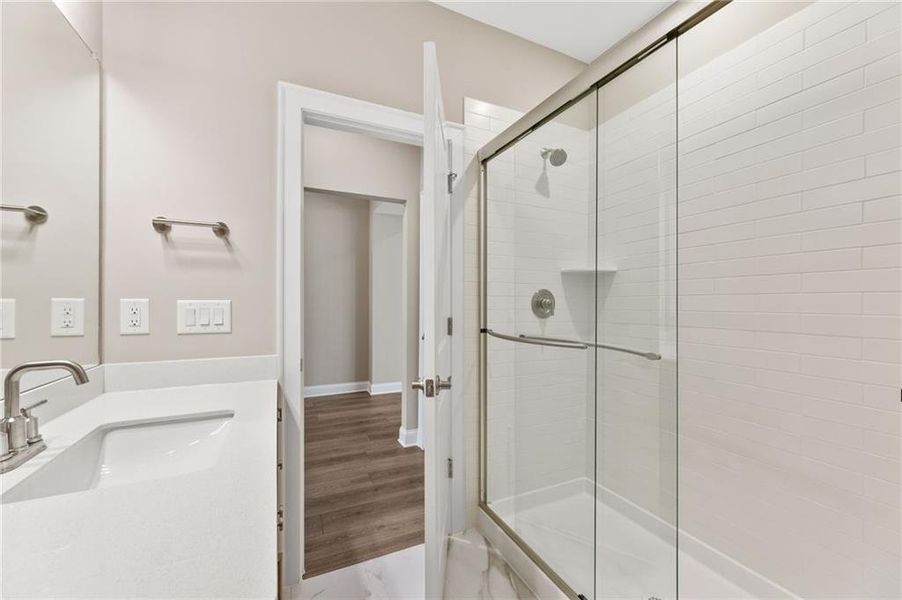 Furnished interior view inside a new home in The Courtyards at Bailey Farms, Dacula (Image 9).