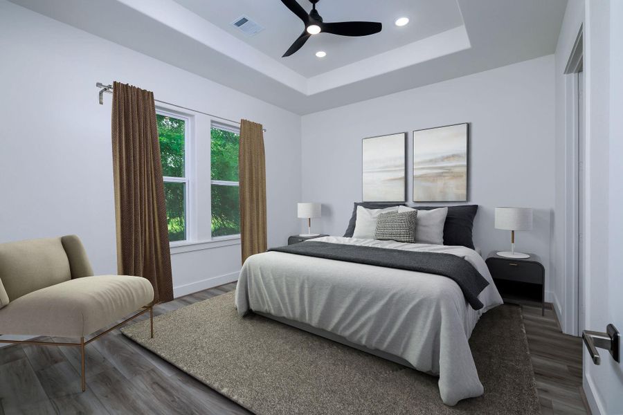 Virtually staged primary bedroom w/coffered ceiling