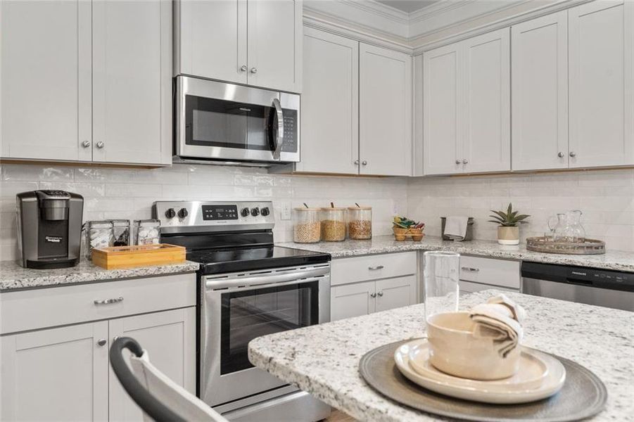 Furnished interior view inside a new home in Summerfield Place, Carrollton (Image 15).
