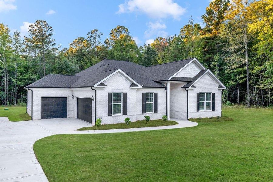 Front exterior of a new home in , Haddock, GA, highlighting curb appeal (Image 27).