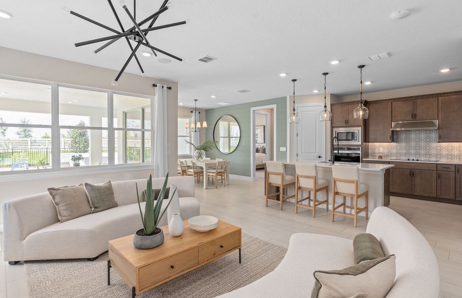 Representative furnished interior of a home built from the Coral Grand by Pulte Homes in Avera, Orlando (Image 9).