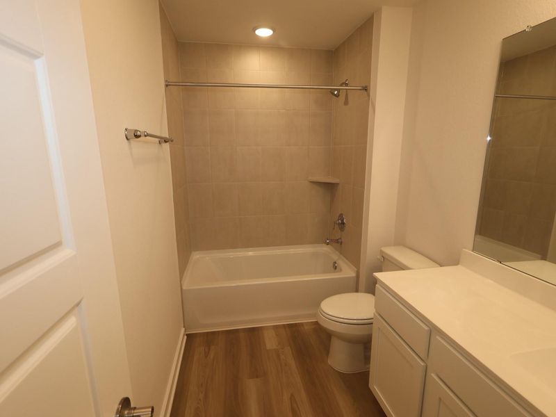 Furnished interior view inside a new home in Pinewood at Grand Texas, New Caney (Image 5).