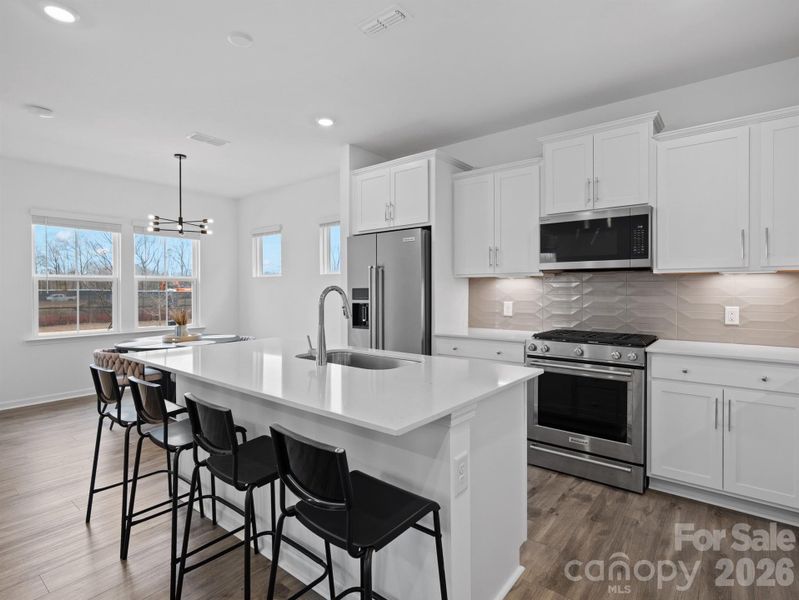 Furnished interior view inside a new home in Riverstone, Monroe (Image 9).