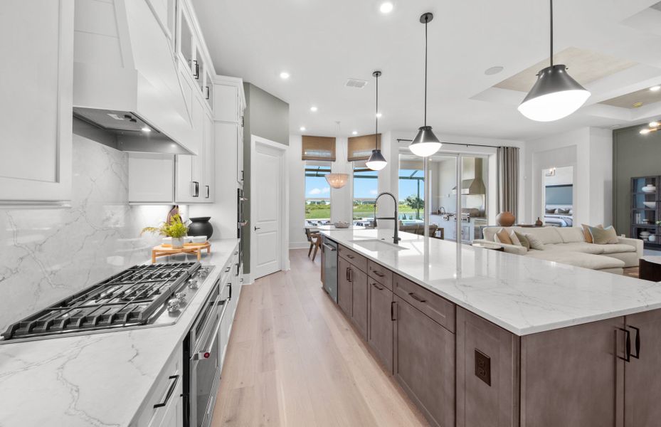 Representative furnished interior of a home built from the Layton Grande by DiVosta in BeachWalk by Manasota Key, Englewood (Image 22).