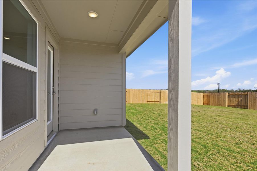 Exterior details and patio area of a home in Infinity Square, Kyle (Image 3). Exterior details and patio area of a home in Infinity Square, Kyle (Image 3).
