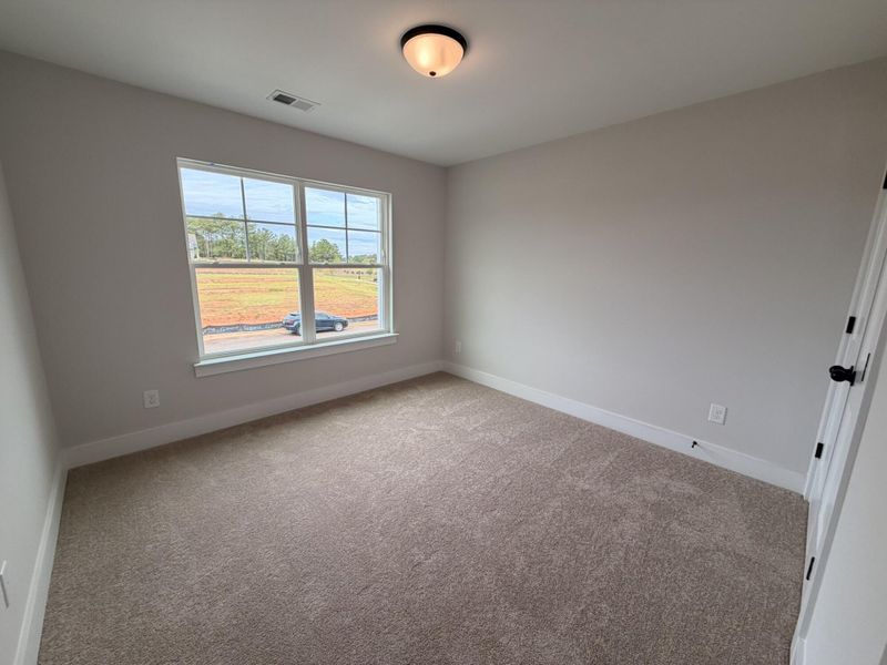 Spacious, unfurnished interior of a new home in Blythe Mill Townhomes, Waxhaw (Image 22).