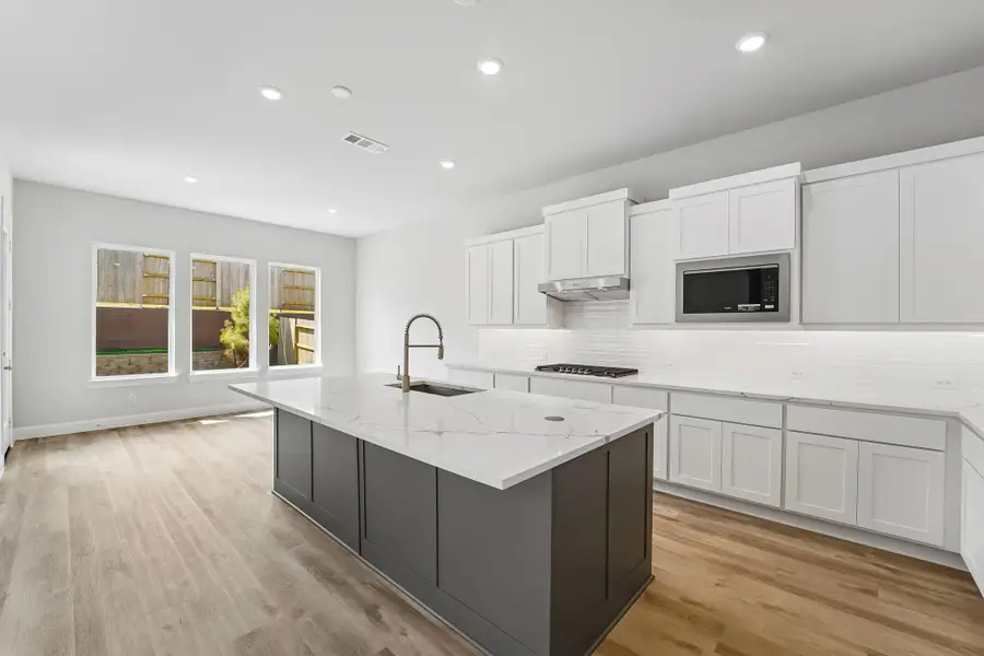 Furnished interior view inside a new home in WILDTREE 60', Montgomery (Image 13).